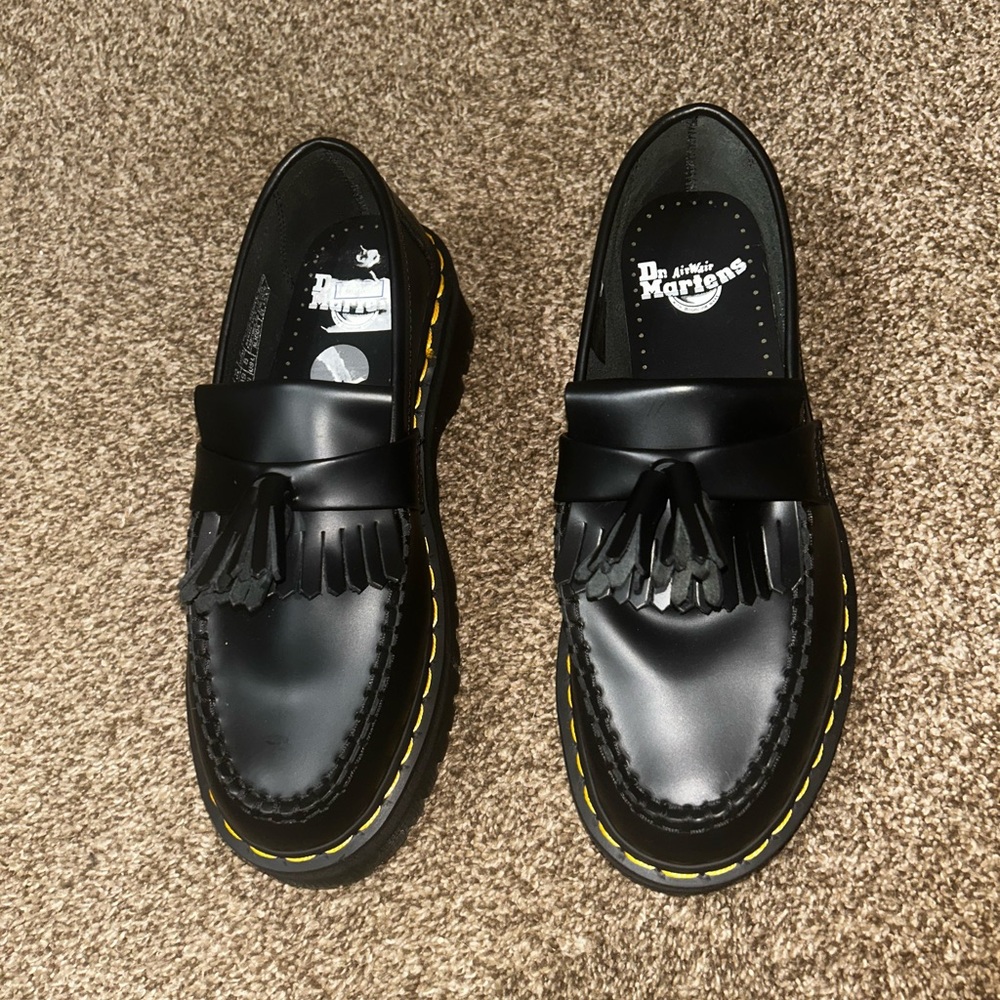 Dr. Martens Black Tassel Kiltie Loafers with Yellow Stitching
